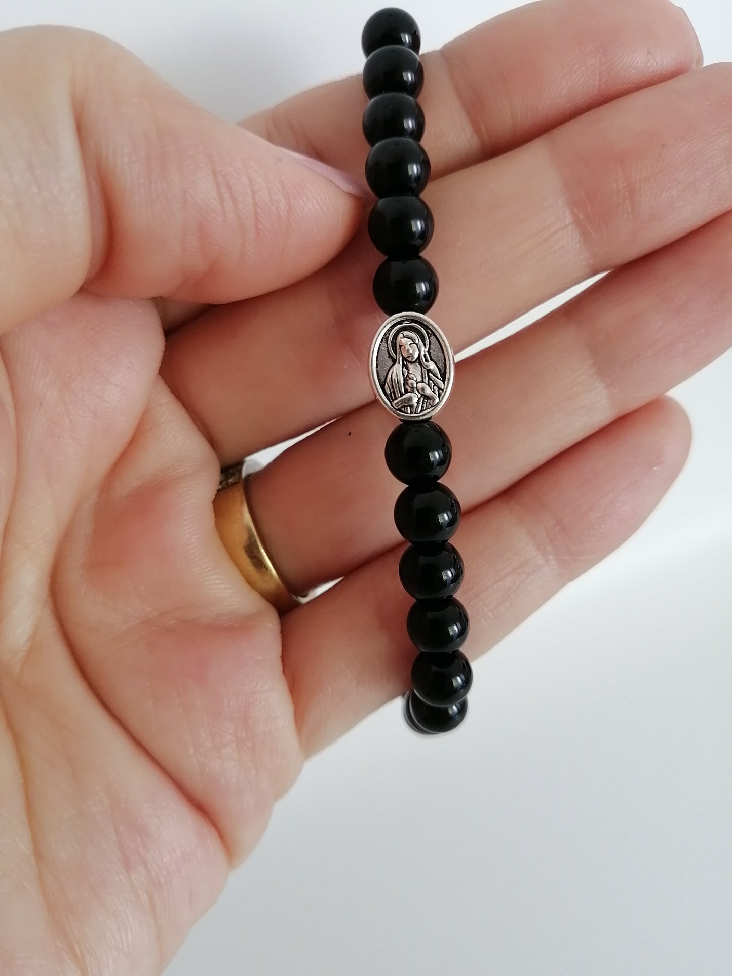 Zwarte agaat armband met religieuze accessoire
