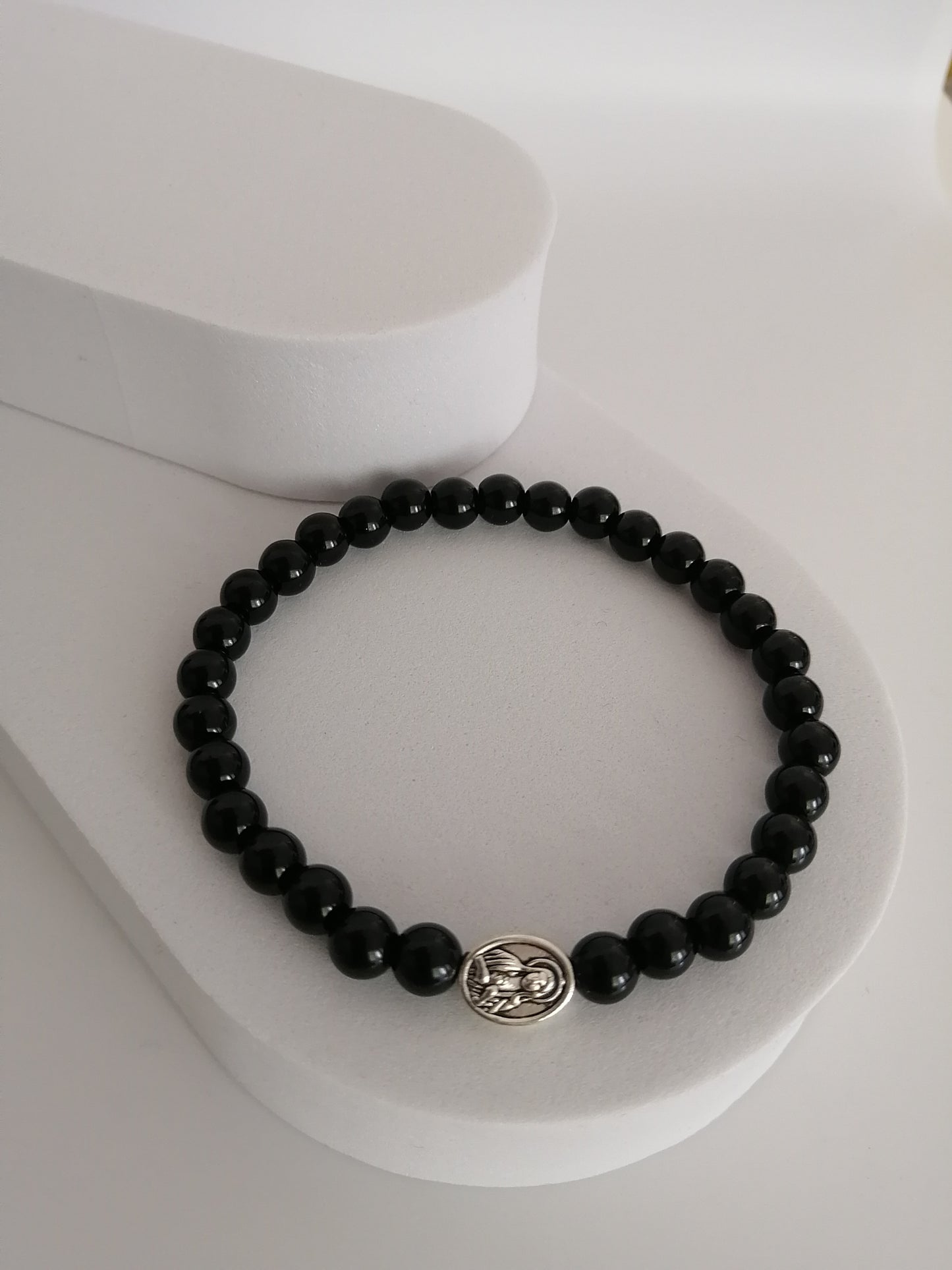 Zwarte agaat armband met religieuze accessoire