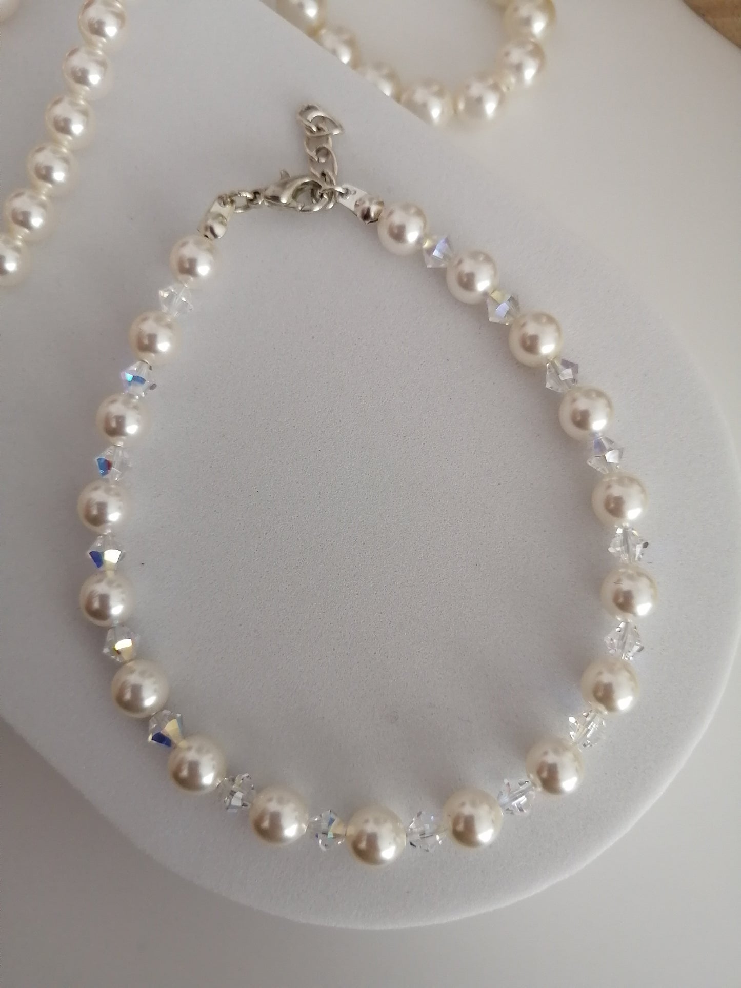 Armband gemaakt van 6 mm parels en 4 mm Swarovski kristallen