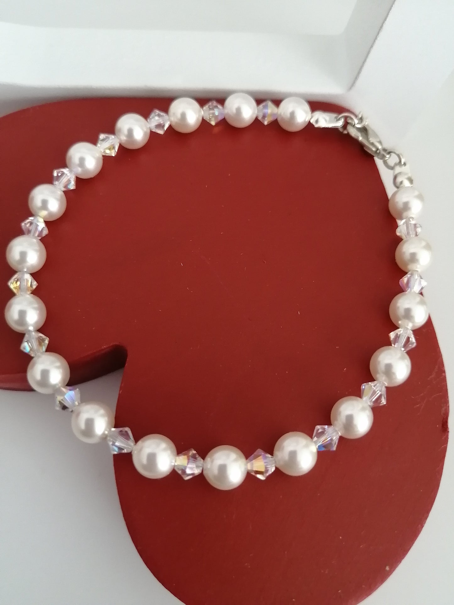 Armband gemaakt van 6 mm parels en 4 mm Swarovski kristallen