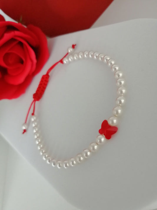 Bracelet réglable en perles et papillon rouge